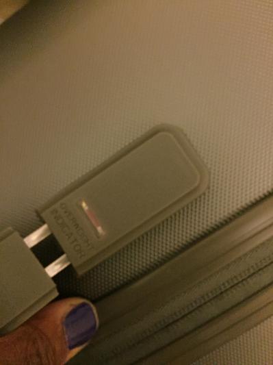 Tension on handle for red weight indicator