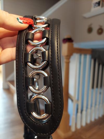 Beautiful silver detailing and wide strap