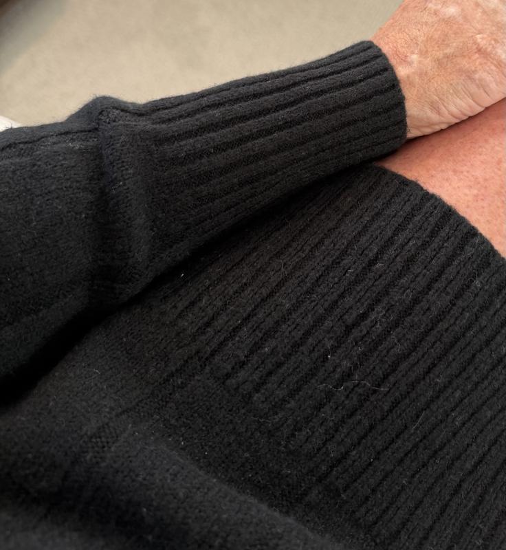 Long ribbed cuffs and ribbed hem add nice detail