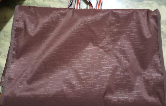 Tri-fold padded garment suiter