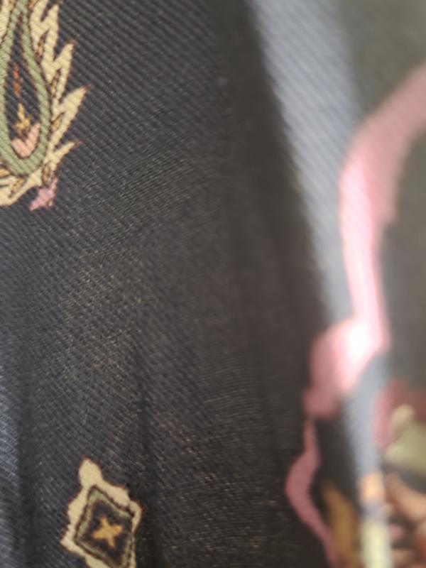 You can see the sleeve has stretch to it which is nice. The colors are beautiful and stick out.