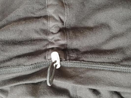 nicely sewn & clasp on interior of waist area to drawn in waist area