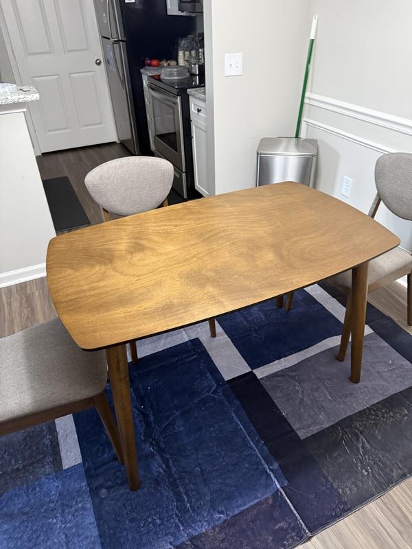 Piece that was broken, remaining chairs and table assembled