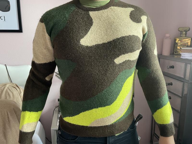 Sweater on my son. I think it works well as a unisex sweater. A little small for him but good for me.