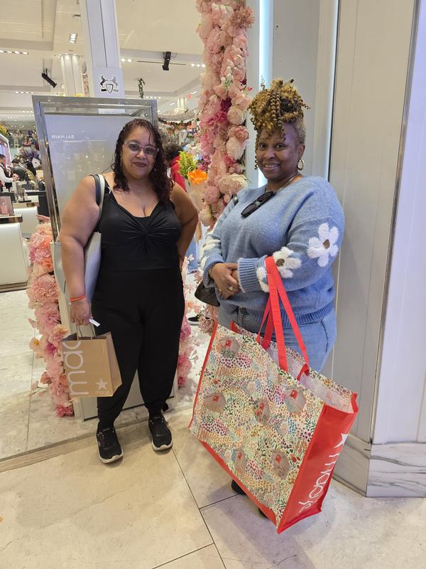 My friends at the Carolina Herrera counter. Stopping to take a picture with my friend after our purchase.