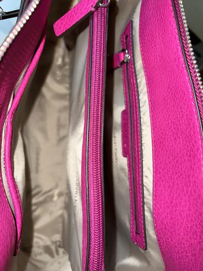 Photo to highlight both the smaller and larger zipped compartments inside the main compartment