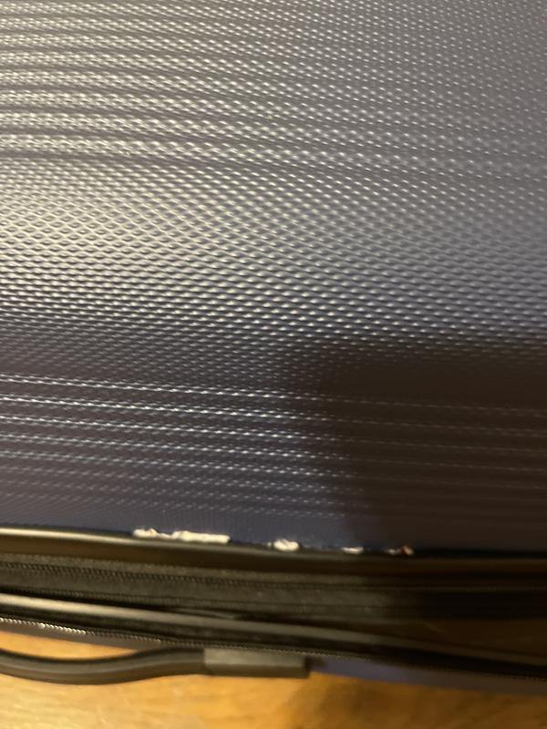 edges of papers cannot be taken out from the luggage
to look it clean.