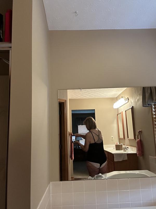 The back. I wore panties so it would show the thin strap that goes between the legs