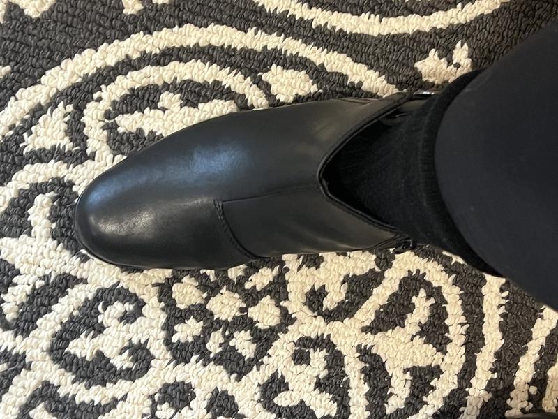 As I walk, the open area goes back and forth and hits my leg. Too wide.