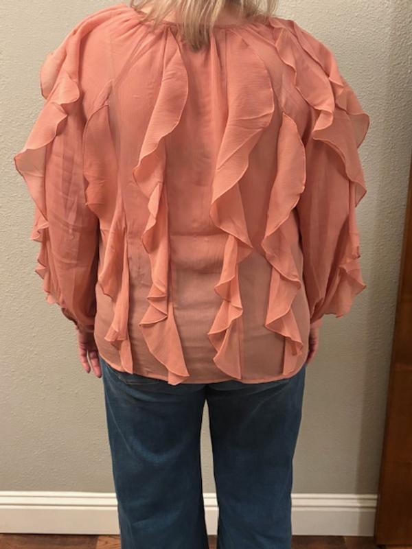 It's a little snug and sheer. A size bigger would be better