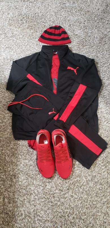 The Cap is generic and Shirt is Macy's Inc clothing line.