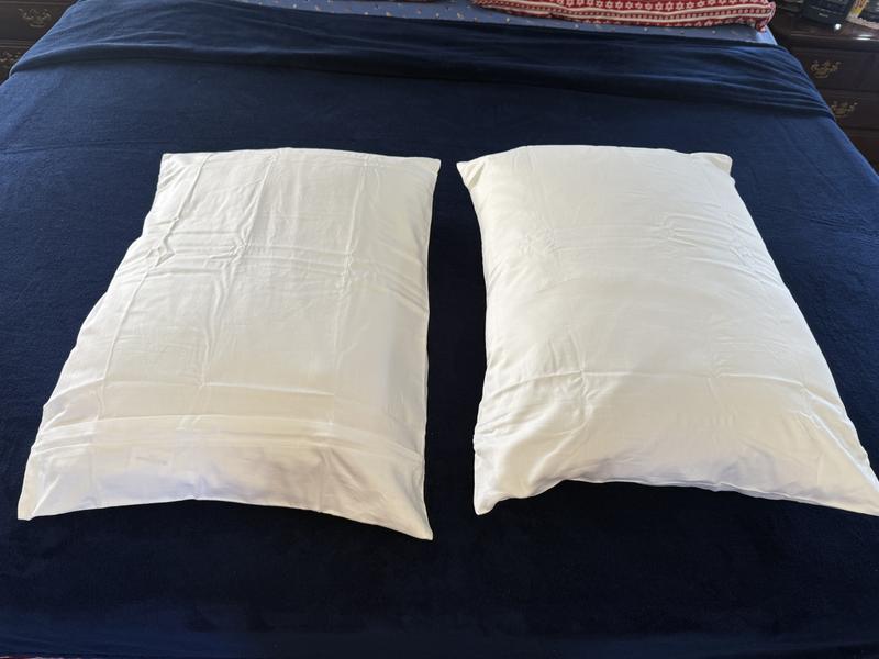 Side by side with hidden zipper on top on one and bottom on the other