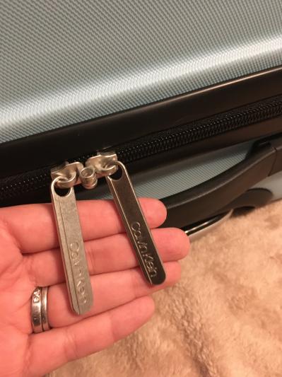 LOVE the long zipper pulls. Makes it easy to zip and unzip luggage.