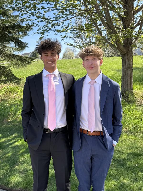 Boy on left wearing Perry tie