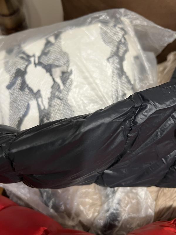 Red coat from last year black coat bought this year. Much thinner material this year