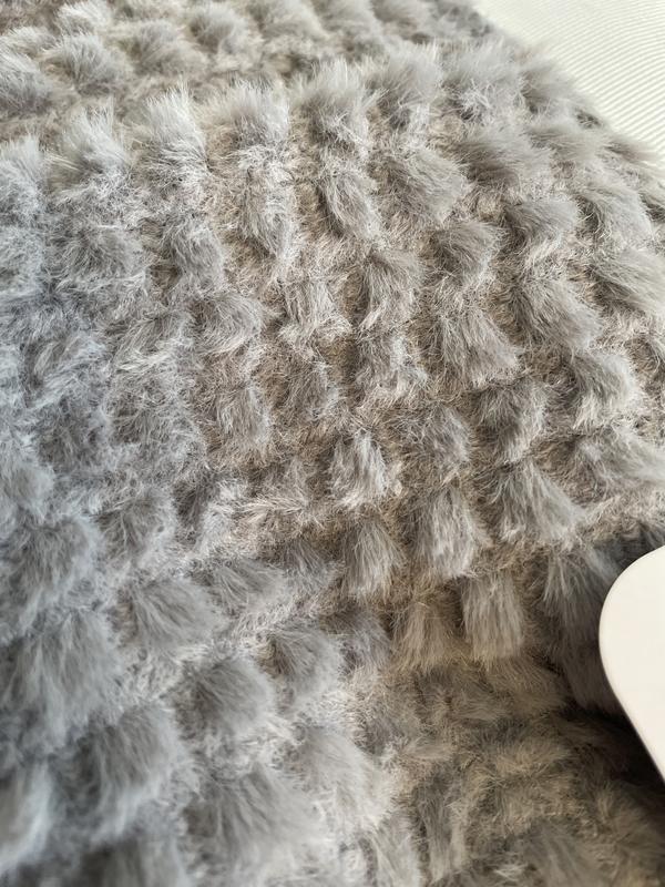 Hard to capture but it almost feels threadbare.