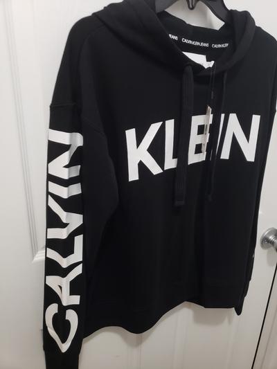 printed logo on both sleeves and front of the sweatshirt
