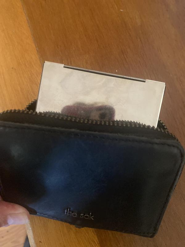 My metal CC holder fits perfectly in the Sak!!