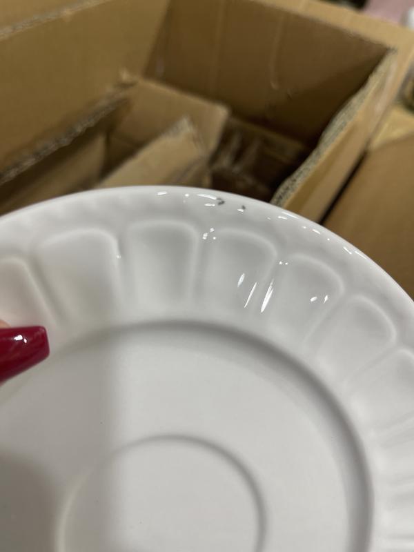 Black particles baked into esge of the dish.