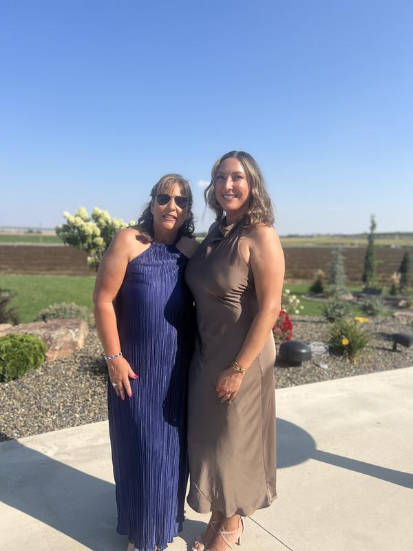 The blue dress is the item that is being reviewed