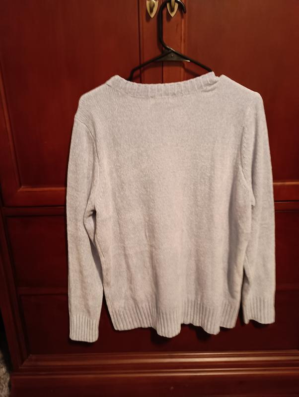 Back of sweater is plain.