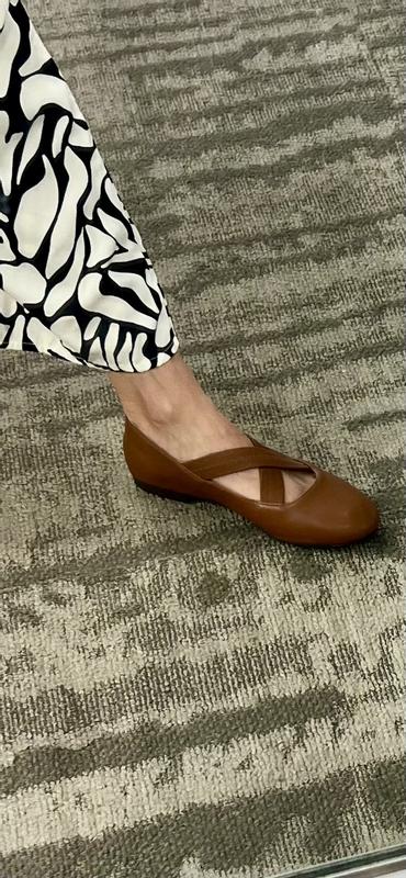 Trying them on at the store.