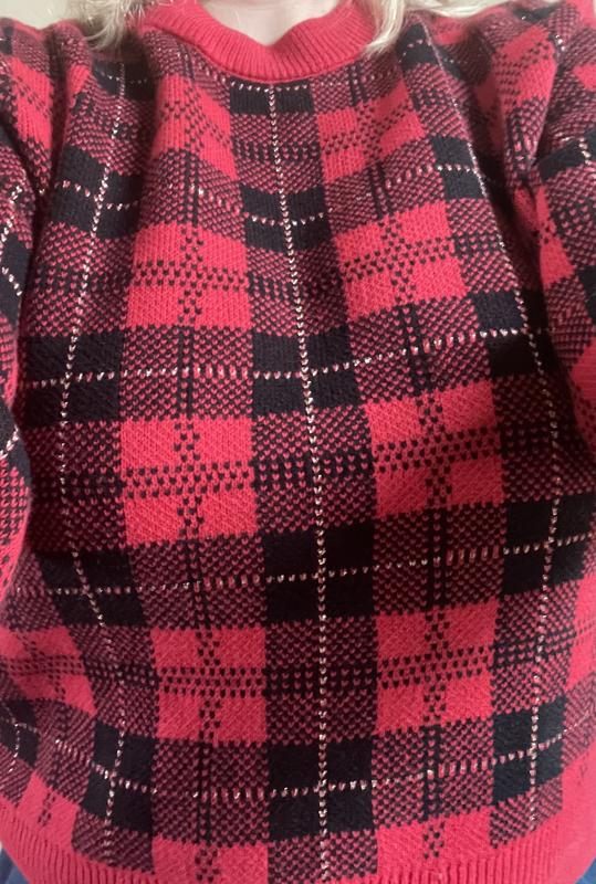 Front view, showing the pattern, puffy sleeves and neck and waistband.