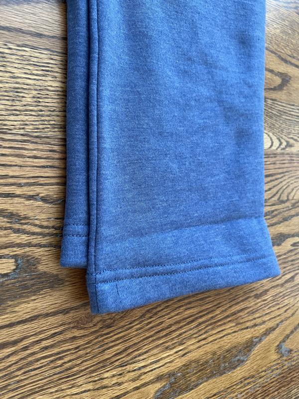 One leg is longer than the other.