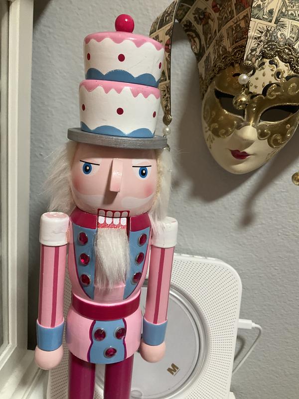 Close up of upper body, with rhinestones.