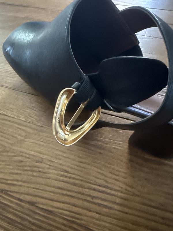 Cheap metal buckle with a flimsy prong