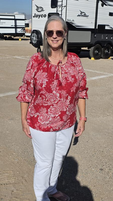 Tassels tied at the top, with sleeves pulled up.