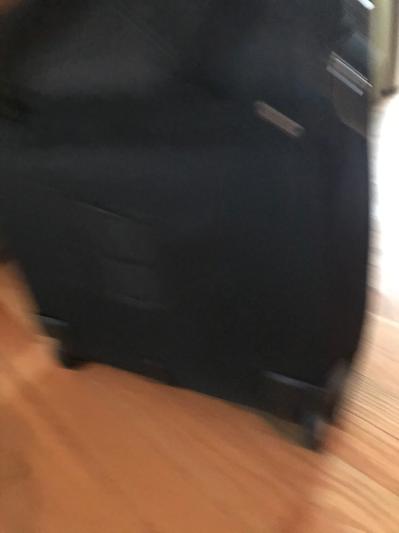 Velcro back to slide over checked luggage