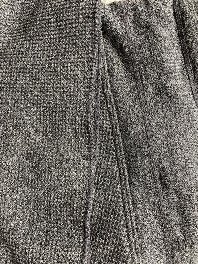 On the left is the pant fabric, middle shows the raw stitched hem, and the waistband fabric is shown on the right.