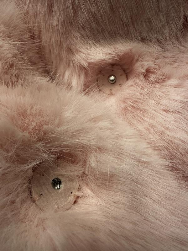 Nice quality.  Heavy Jacket. Very fluffy. Stiching is top quality.  This jacket will surely make a statement when worn!  Very fashionable!