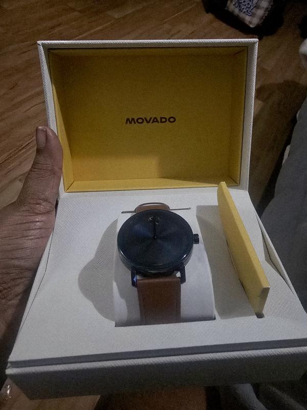 A beautiful blue and cognac  with contrasting yellow and cream box. It's a perfect gift.