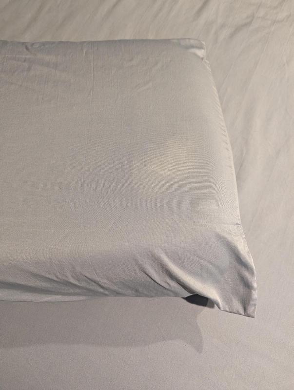 I didn't add bleach but this pillowcase came out with a white spot.