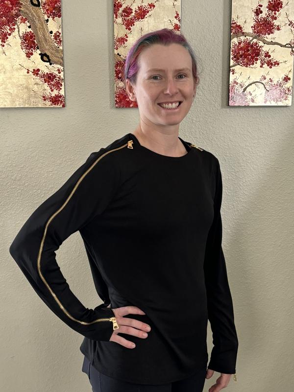 Can see how the zipper pulls on fabric of the sleeve