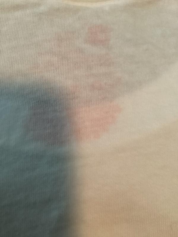 Red printing shows through on back
