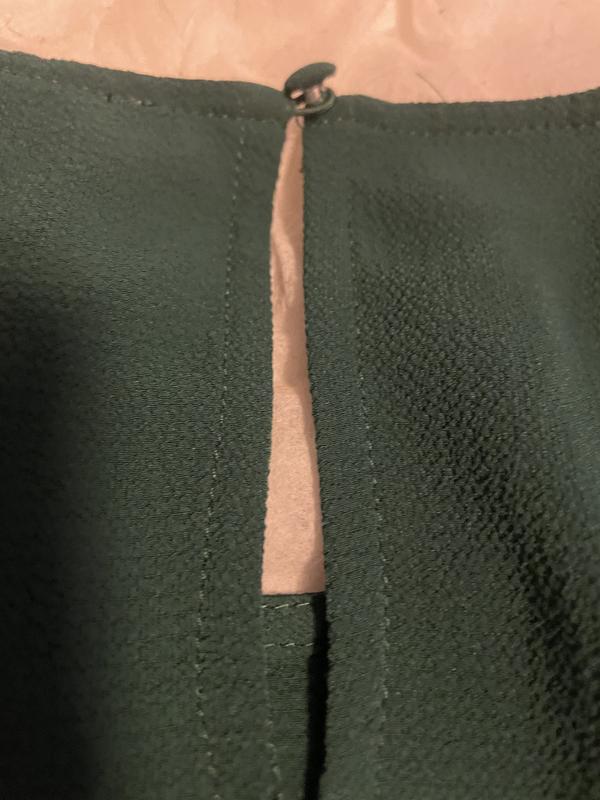 Back with covered button