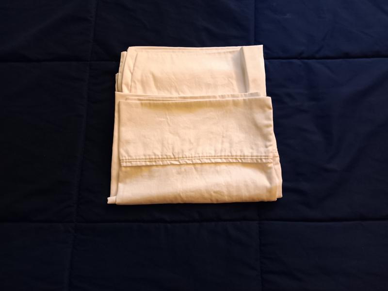 The pillowcases after being laundered but not ironed.