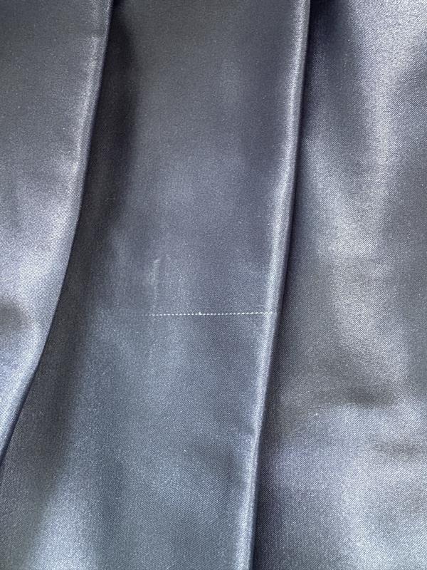 Flaws throughout skirt of the dress