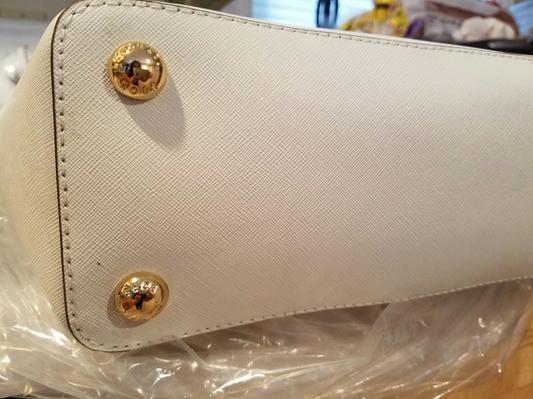 dirty/sticky discolored spots on bottom