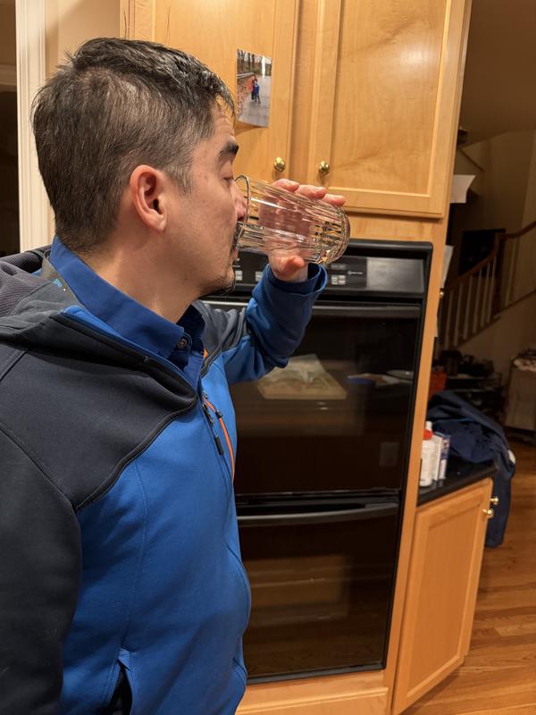 Drinking from taller glass