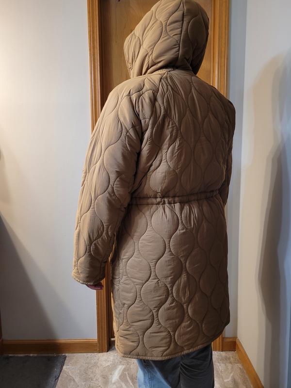 Definition at cinched waist, plus a detachable hood