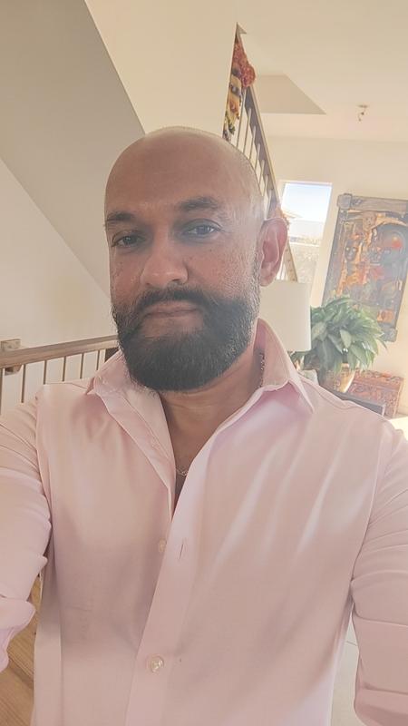 The shirt was bought at Macy's but that's tailored men's fit shirt