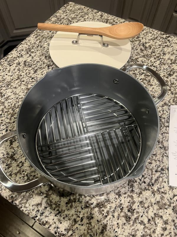 comes with wooden spoon, lid, roaster tray and pot