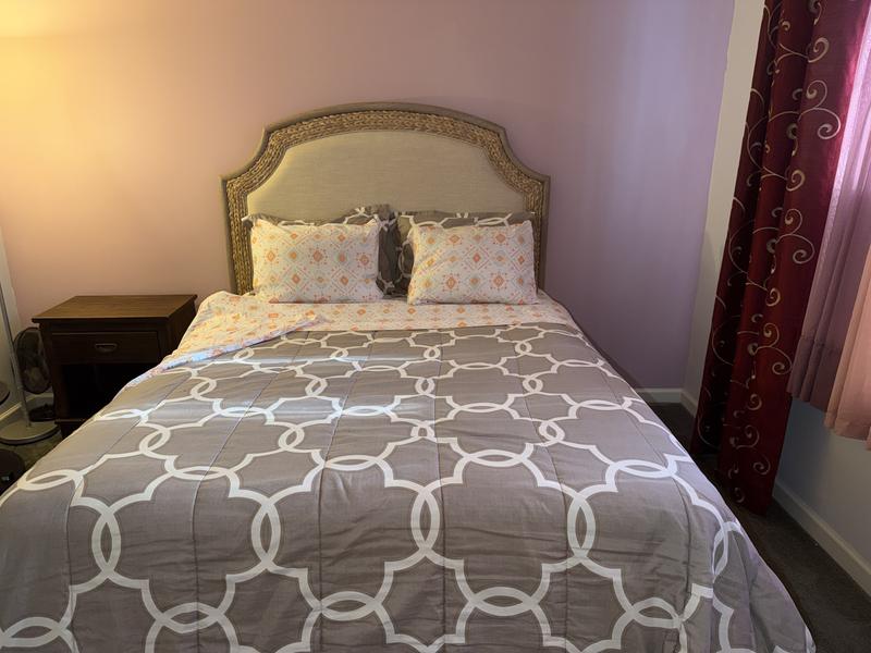 Bed frame set up to fully made bed