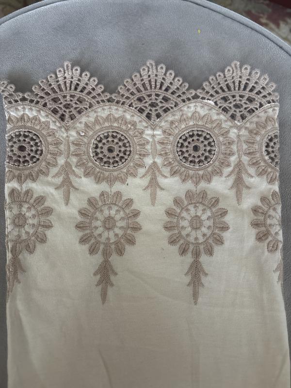 Embroidered design on sleeve