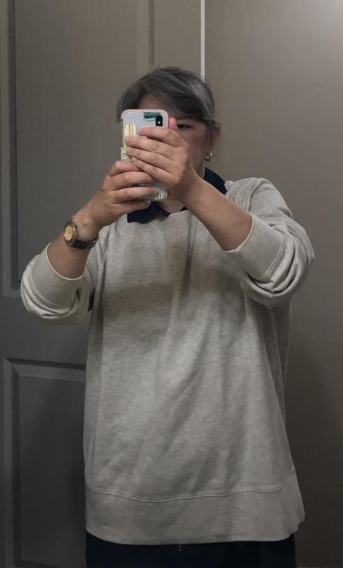 sweatshirt over denim dress