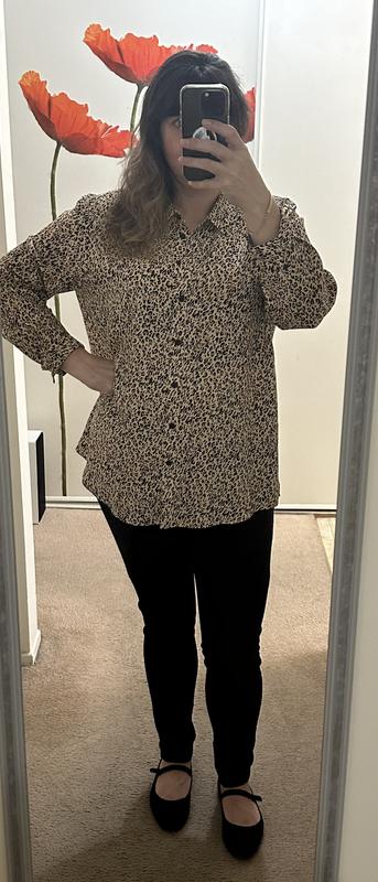 Shirt worn with black denim leggings.